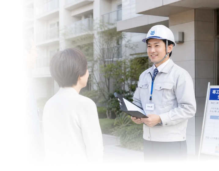 お客様と打ち合わせをする担当スタッフ